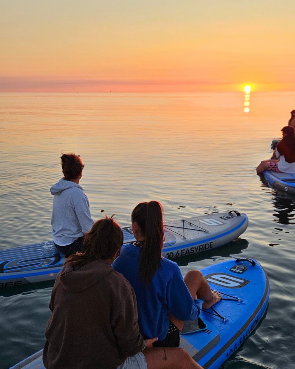 Gruppo in SUP all'alba a Cesenatico